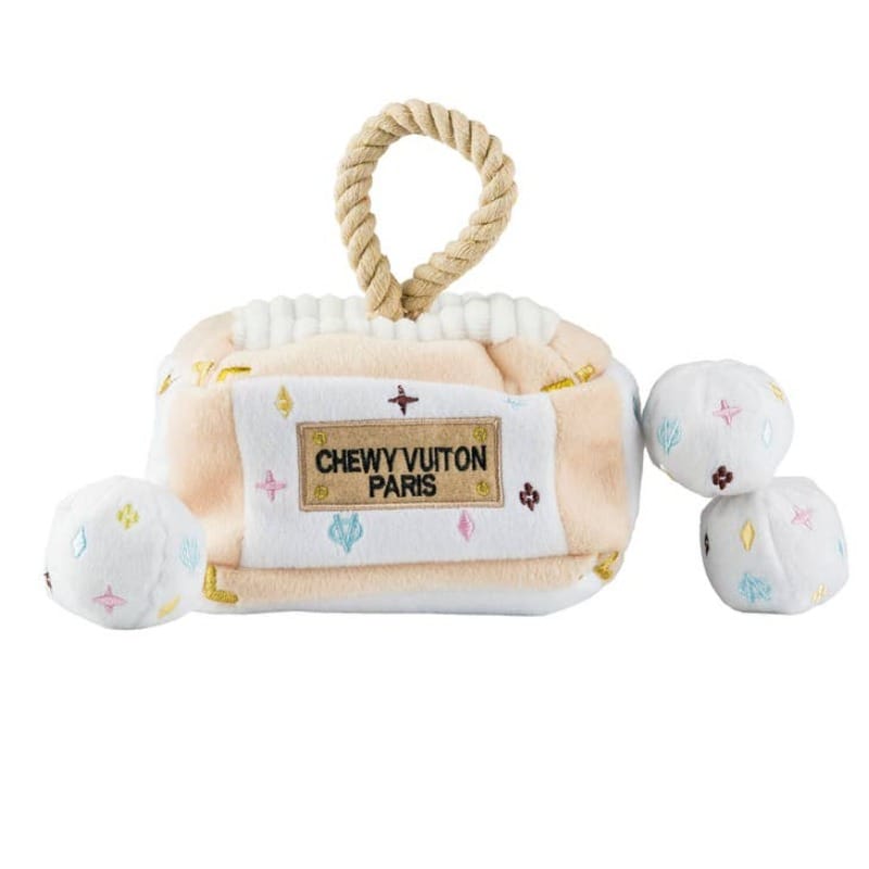 Cream plush dog activity house toy with rope handle and two star-print paw pieces