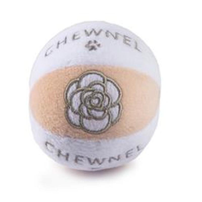Plush squeak dog toy ball in blush and light lavender with Chewnel paw logo