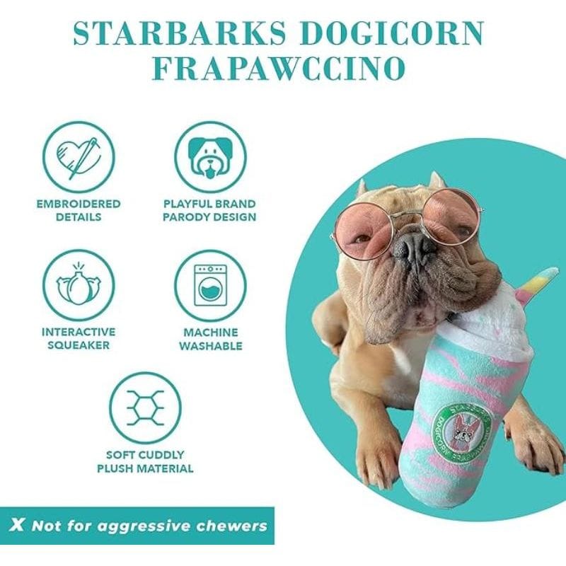 Dog holding teal and pink striped unicorn-horn plush drink toy with logo patch