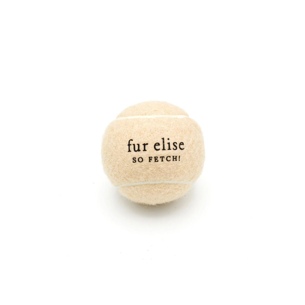 Latte beige tennis ball with 'fur elise so fetch!' text on front