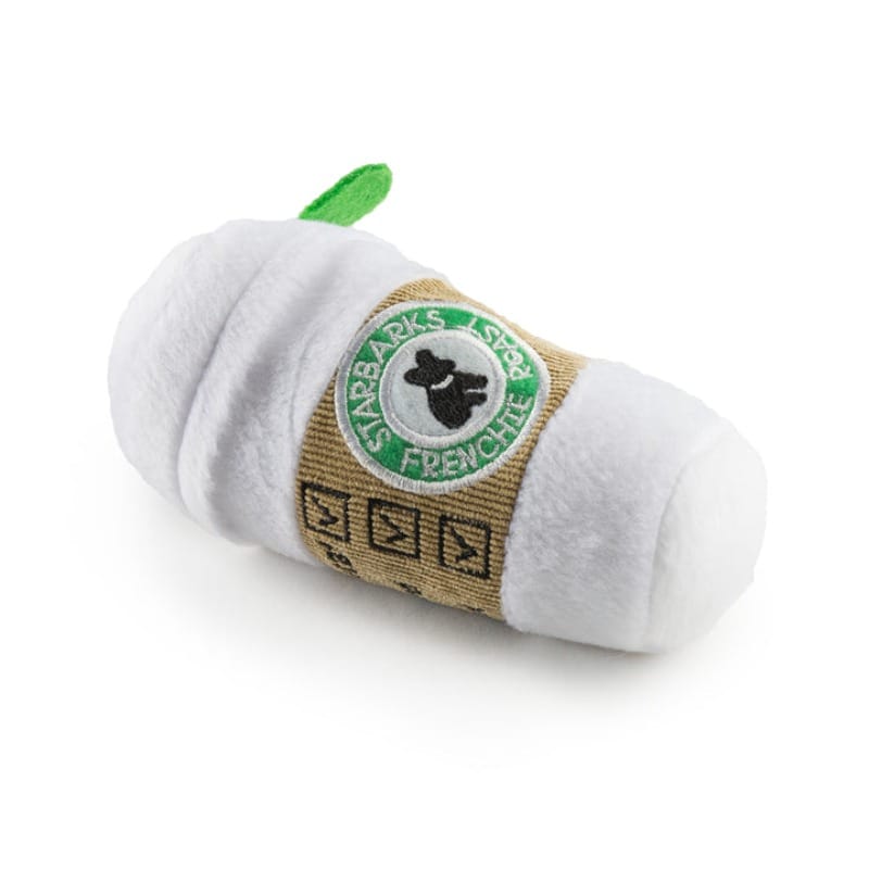 White plush coffee cup dog toy, sideways view with green leaf and STARBARKS logo.