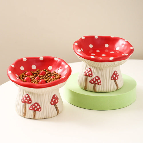 Ceramic mushroom pet bowl with red polka-dot interior and cream stem, two bowls