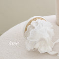 White lace straw hat with scalloped lace brim and bow