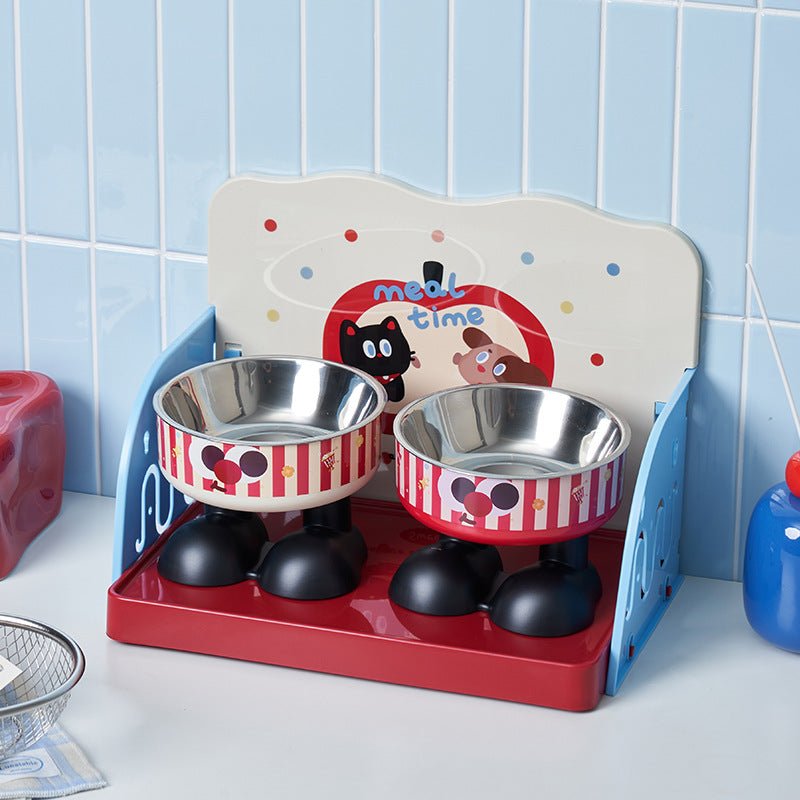 Anti-spill pet feeding tray with splash guard, red base and two stainless bowls
