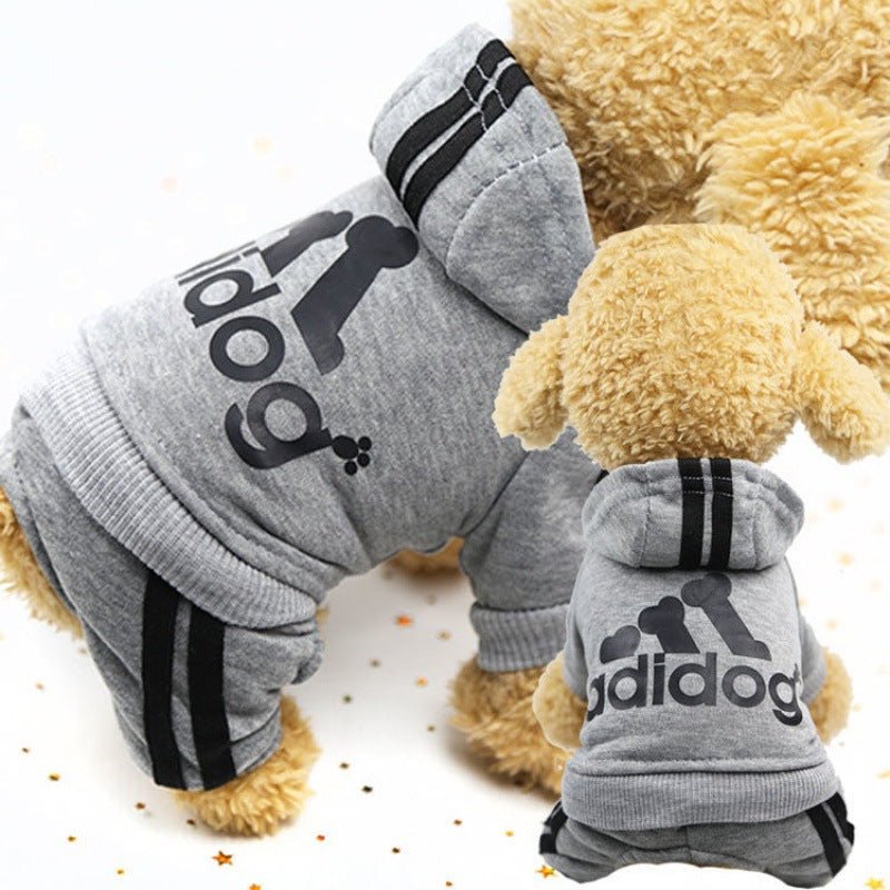 Gray dog winter hoodie with hood, adidas dog logo, and black-striped cuffs