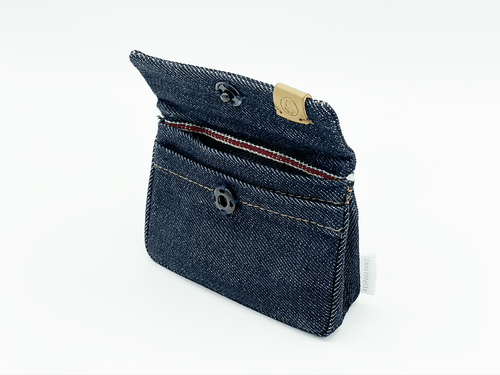 Blue denim card holder and waste bag dispenser with flap, button closure, gold logo