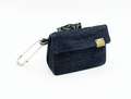 Denim waste bag dispenser with card holder, blue fabric, metal hook, gold logo patch