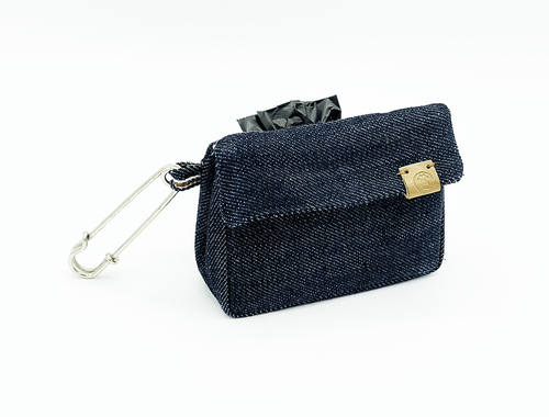 Denim waste bag dispenser with card holder, blue fabric, metal hook, gold logo patch