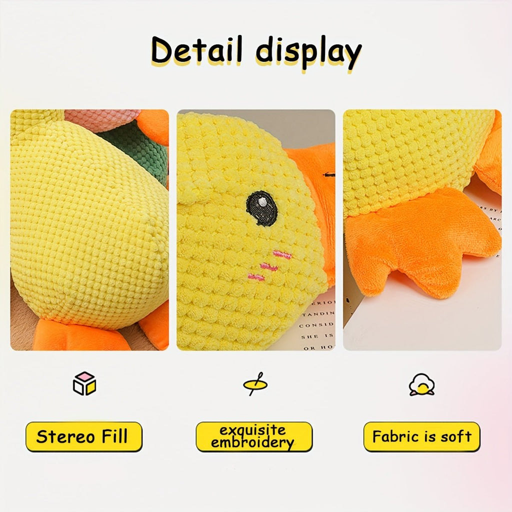 Yellow duck plush toy detail close-ups of embroidered face and orange feet