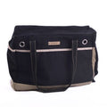 Dark canvas tote bag with zip-top, contrast stripe, metal grommet accents