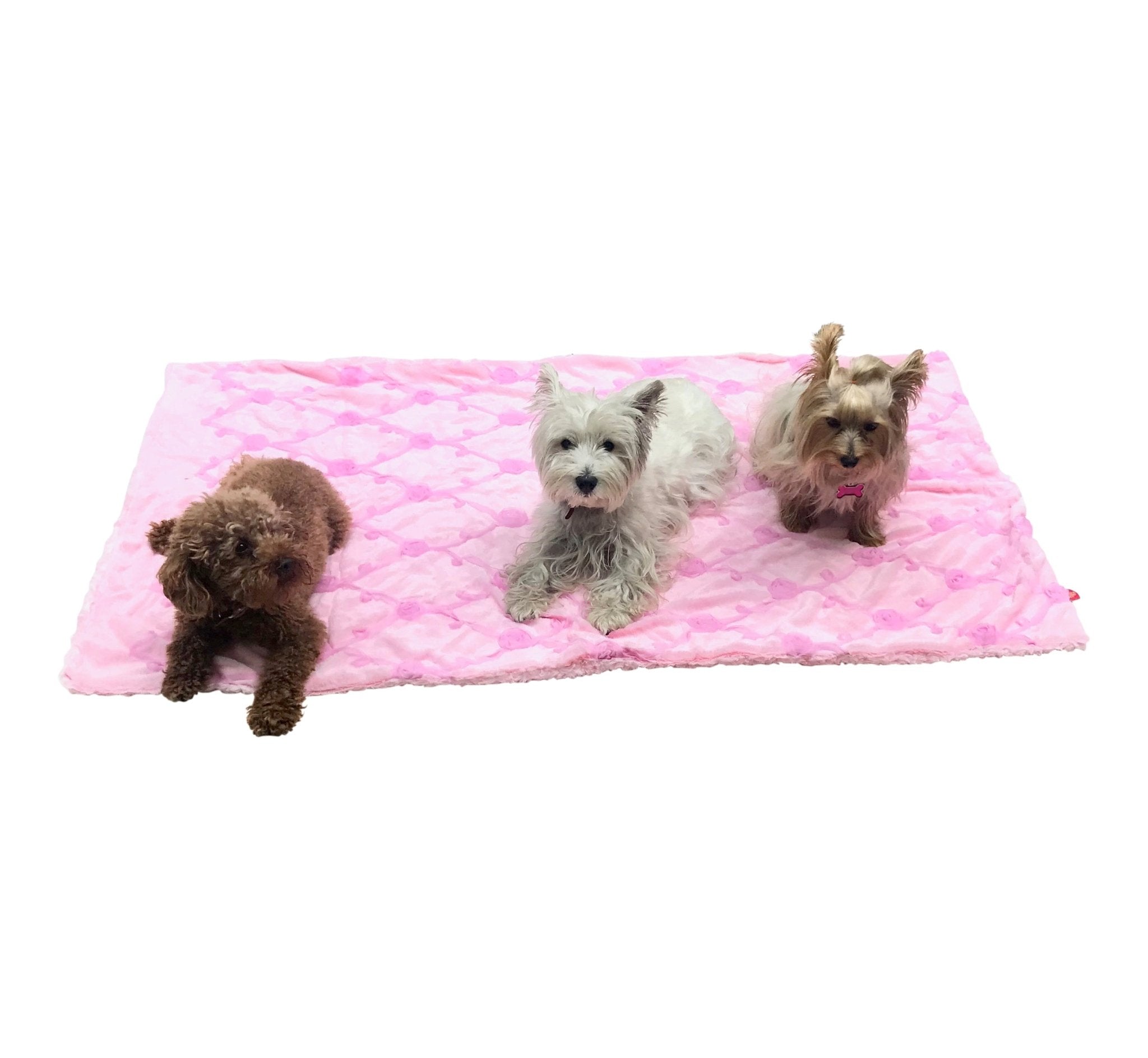 Pale pink rose-embossed quilted blanket with stitched corner detail