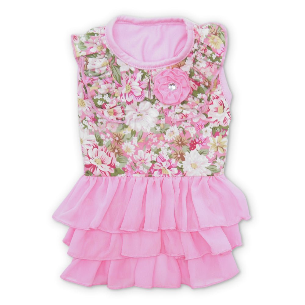 Pink floral dog dress with sleeveless bodice, round neckline, and tiered ruffle hem