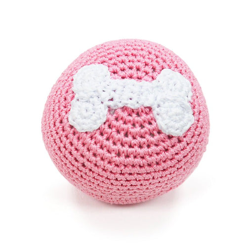 Pink crochet bone ball toy with white bone applique on the front.