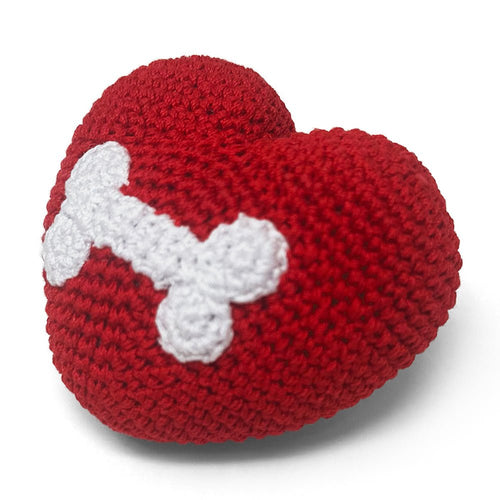 Red crocheted heart toy with white bone appliqué