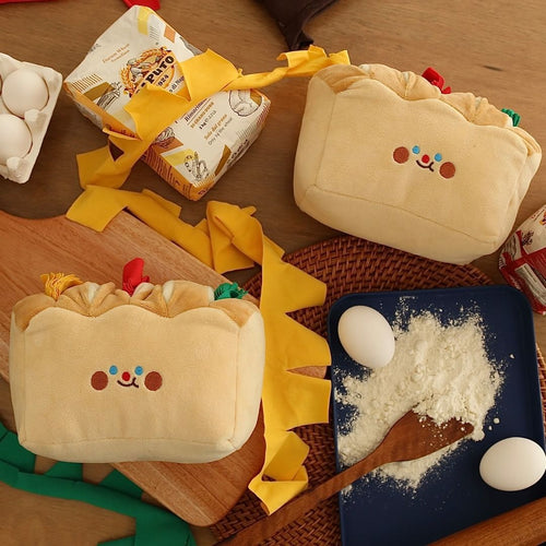 Set of cream plush dog sniffing pouches with cartoon faces and faux food props on tray