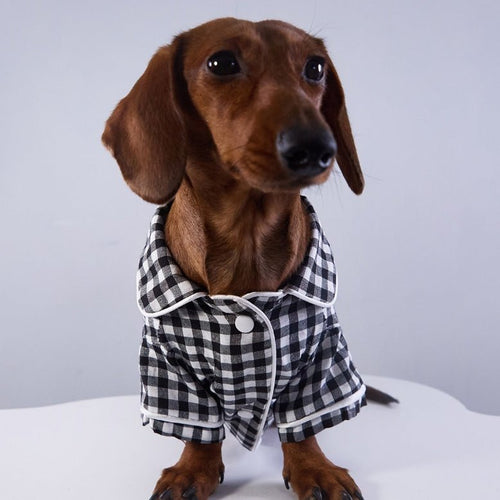 Black-and-white plaid pet pajama shirt with button front and short sleeves