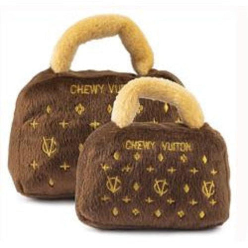 Brown plush squeaky dog toy bag with light handle and gold logo pattern