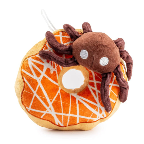 Plush squeaky donut dog toy with brown spider and orange web pattern