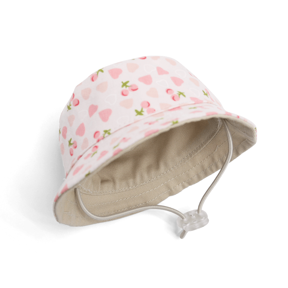 Pink heart-and-cherry bucket hat with beige inner lining and drawstring cord
