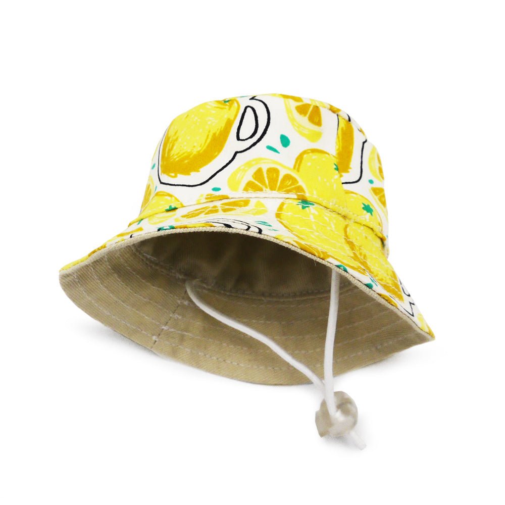 Yellow lemon-print bucket hat with wide brim and visible inner lining