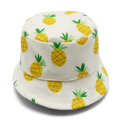 White bucket hat with yellow pineapple print and green leaves, stitched brim