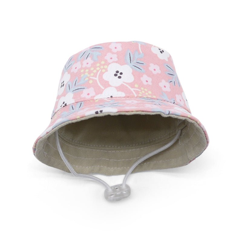 Pink floral bucket hat with tan inner lining and adjustable chin cord