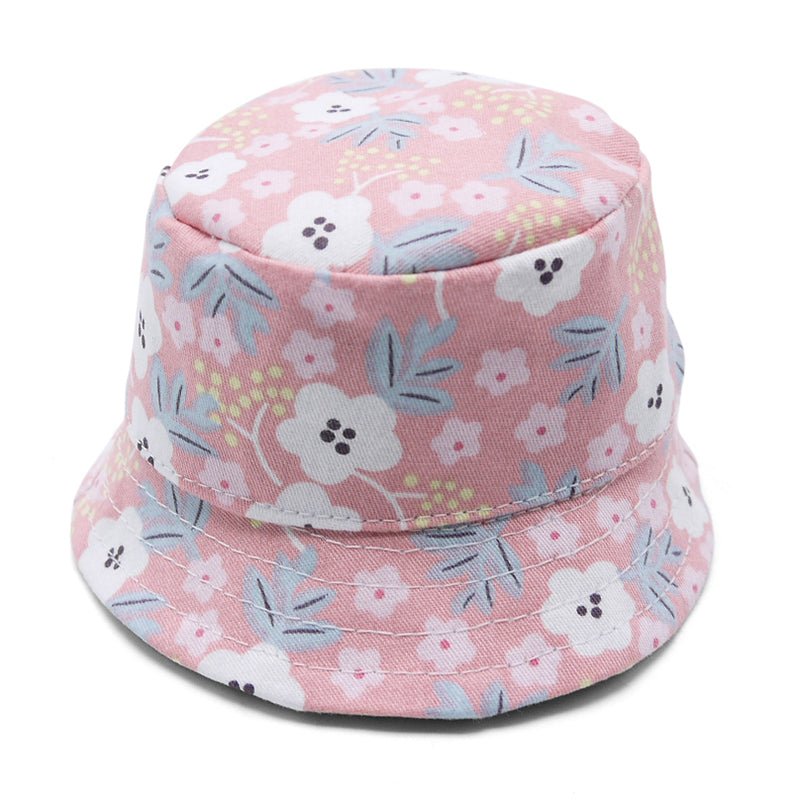 Pink bucket hat with floral pattern, quilted crown and wide brim