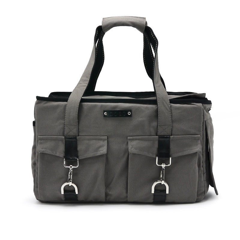 Charcoal tote bag with top handle, front buckle hardware, and side zipper pocket
