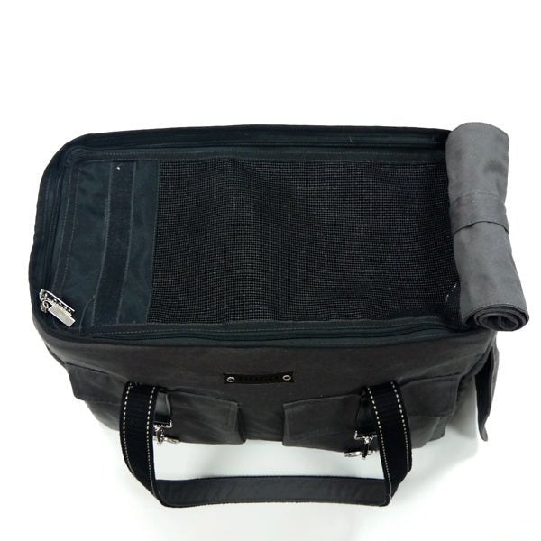 Navy buckle tote bag interior view with zip closure and mesh back pocket