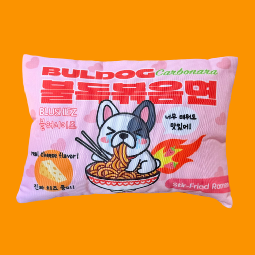 Pink plush dog toy ramen package with blue cartoon bulldog and noodle design