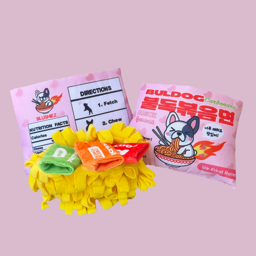 Plush ramen noodles dog toy with yellow noodle mat and colorful mini snack pouches