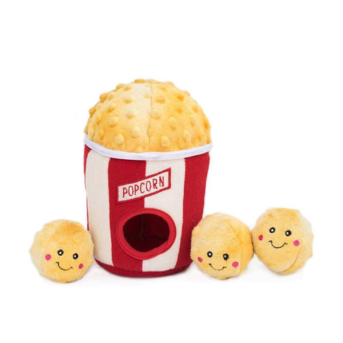Plush popcorn bucket dog toy with yellow popcorn top and four smiling plush kernels