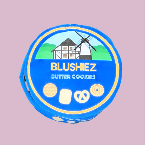 Blue plush cookie-tin dog toy with BLUSHIEZ Butter Cookies logo, round shape