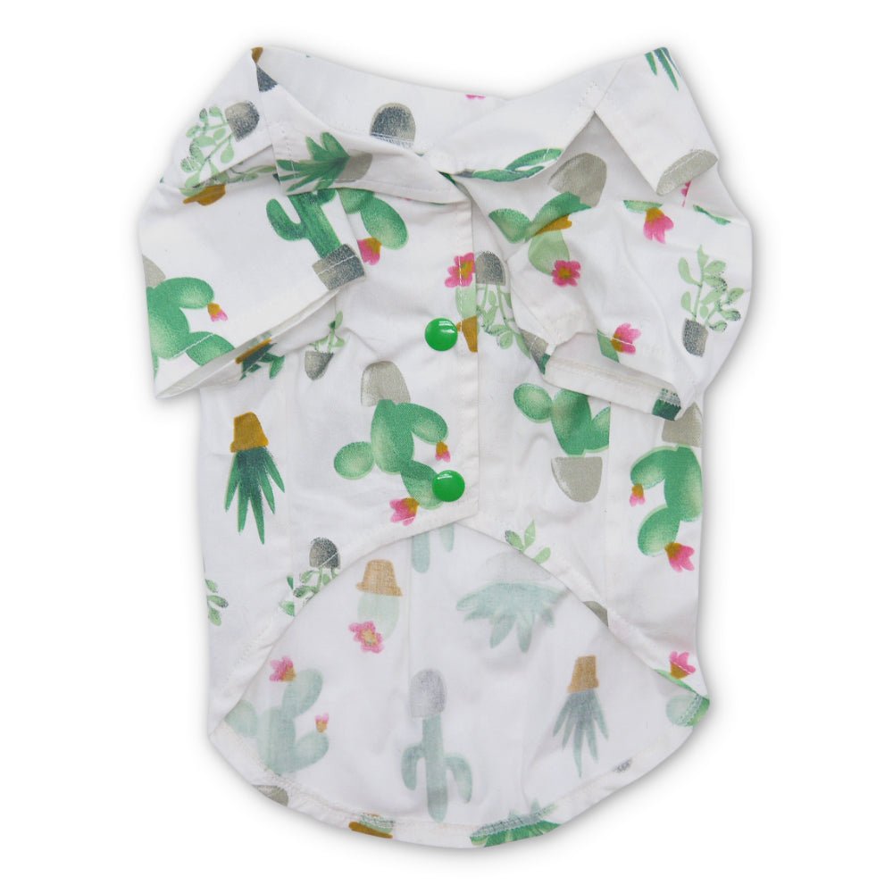 White dog shirt front view, all-over green cactus and succulent print, collared neckline.