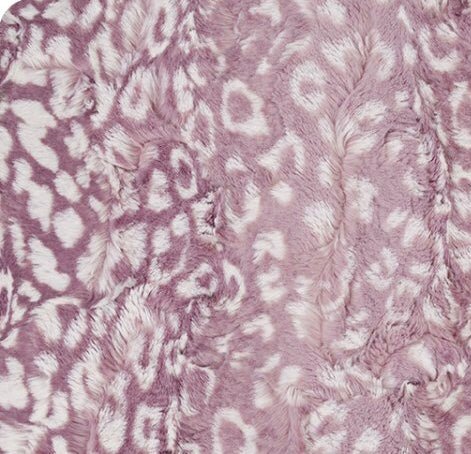 Lilac plush fabric with white leopard-style print and soft velvety pile