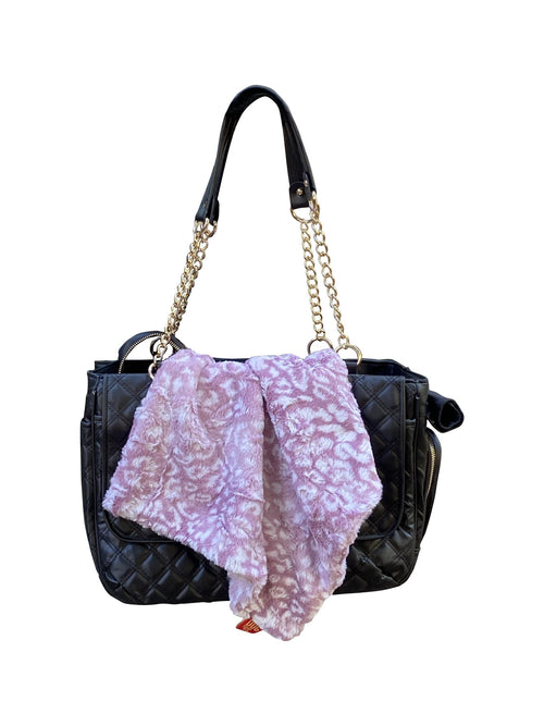Lilac and white leopard-print plush square blanket, draped over bag
