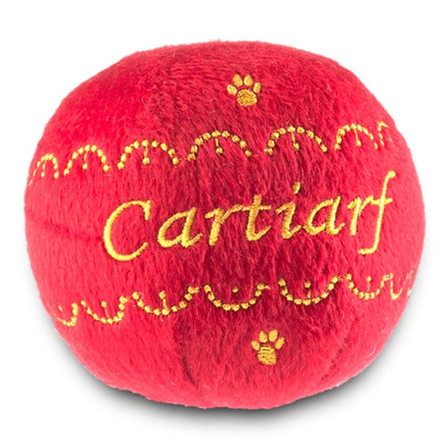 Red plush squeak dog toy ball with yellow paw prints and Cartiarf lettering