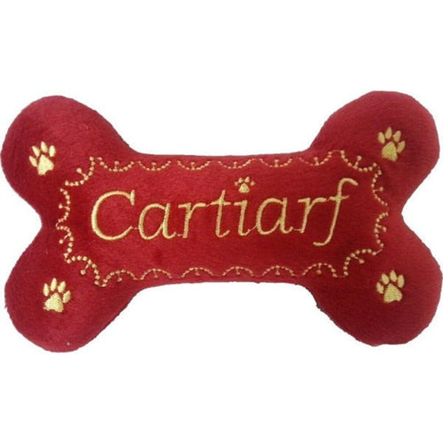 Cartiarf red plush squeaky dog bone toy with paw prints and embroidered logo