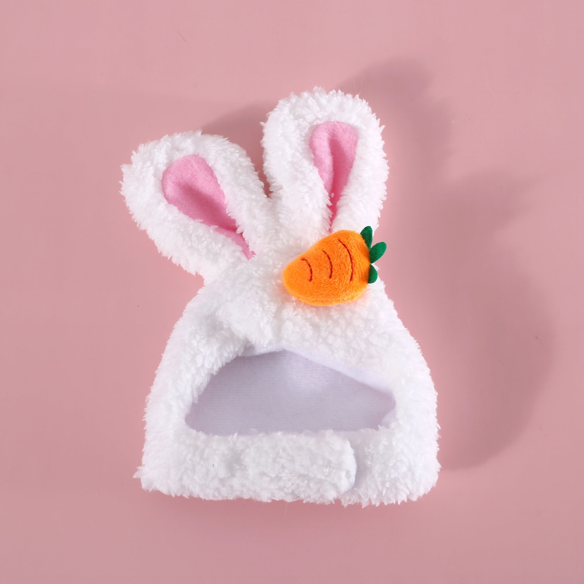 White plush bunny-eared Easter hat with carrot patch, front angle