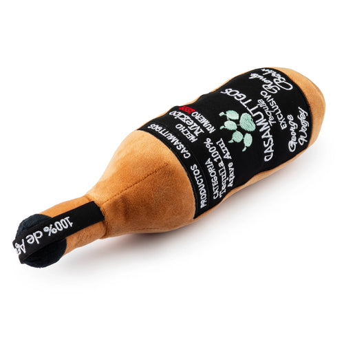 Tequila bottle plush toy, side view: tan fabric with black label band and white logo