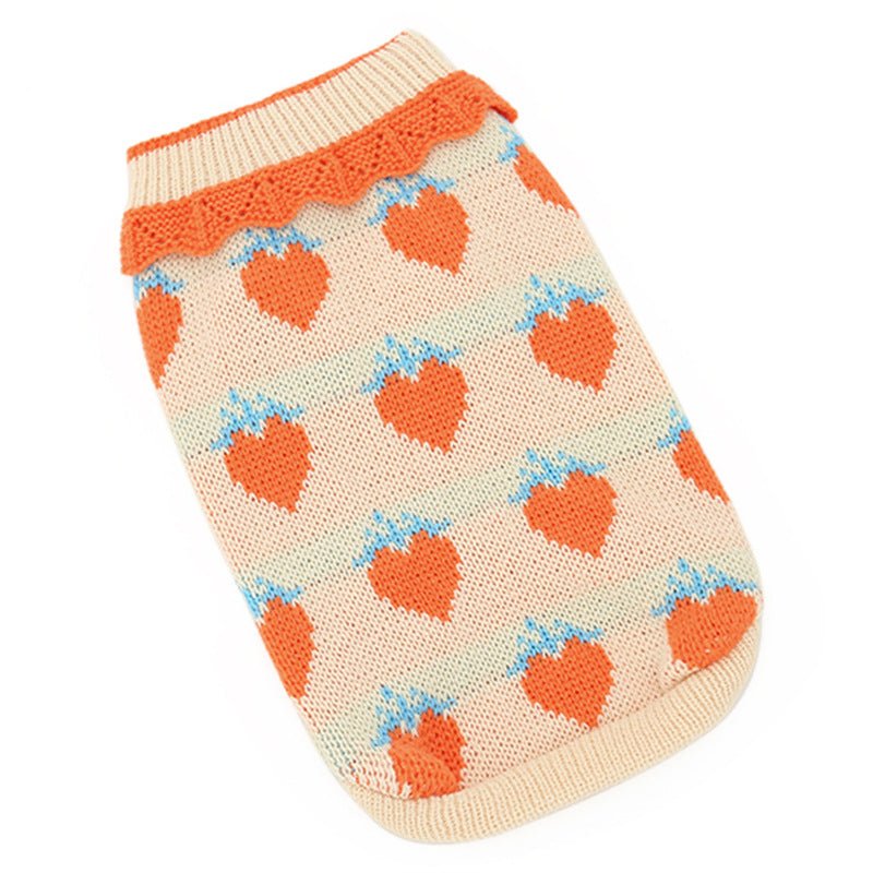 Cream knit cat jumper with orange and blue heart pattern and orange ribbed collar
