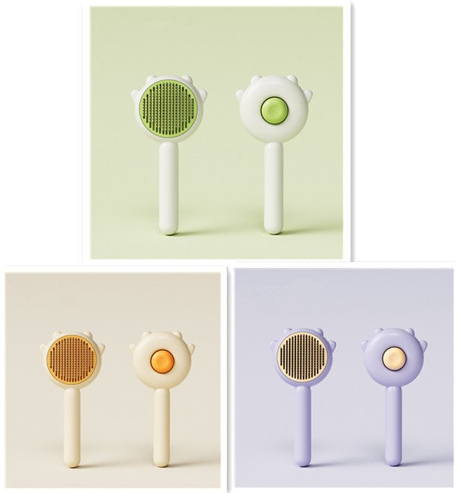 Pet grooming brushes in green, orange, and purple with round massage heads and white handles
