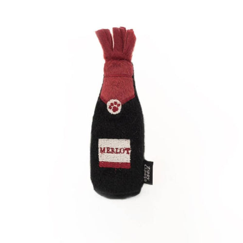 Black plush cat toy shaped like a bottle, with red tuft and Merlot label