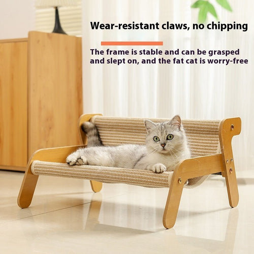 Wood-and-rattan cat scratch lounge chair with woven hammock and resting cat
