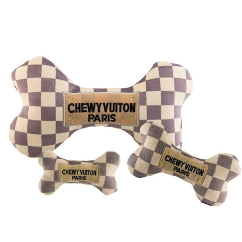 Set of plush squeak dog bone toys in beige and dark check pattern with Paris patches