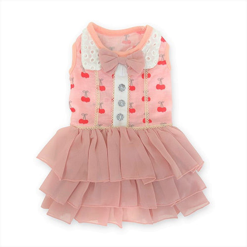 Pink cherry print pet dress with sleeveless design, bow, and tiered ruffle skirt