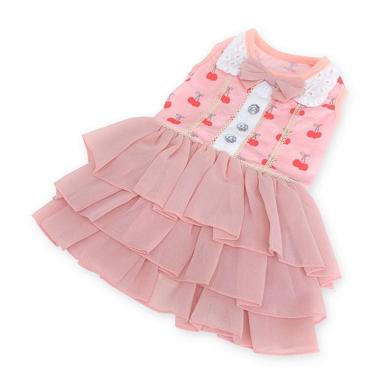 Pink cherry print pet dress with stitched trim, bow neckline, and layered tiered skirt