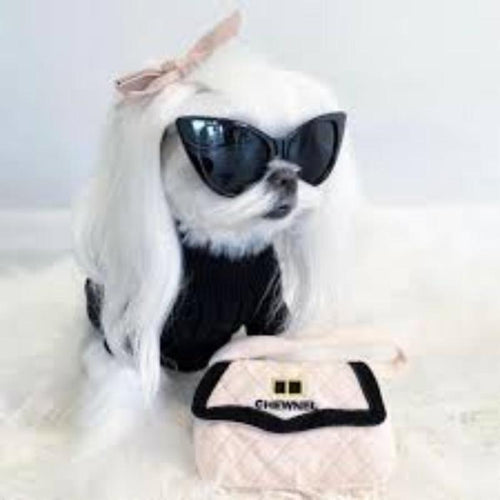 Plush handbag-style dog toy in blush pink quilted plush with black trim and CHEWNEL logo