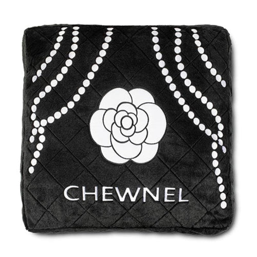 Noir pet bed: black quilted cushion with white flower emblem and CHEWNEL logo