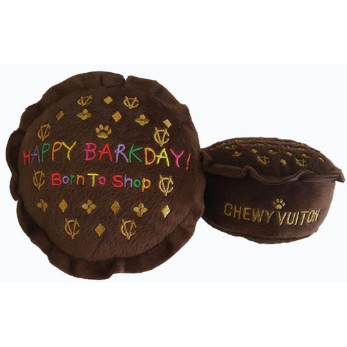 Brown plush squeak dog toy shaped like cake, with Happy Barkday graphic.